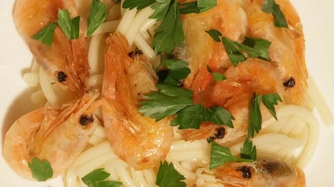 Mediterranean dish of spaghetti with shrimps Stock Footage 74680593