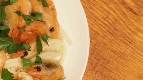 Mediterranean dish of spaghetti with shrimps Stock Footage 74680595