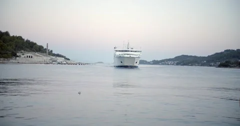 Mediterranean ferry aproaching a station boat sea Stock Footage