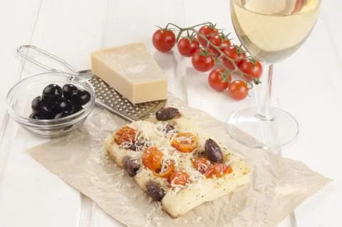 Mediterranean flat bread on brown paper Stock Photos