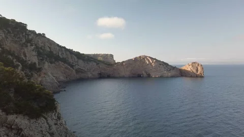 Mediterranean landscape: Cliffs and the "La Foradada" Stock Footage 159980911