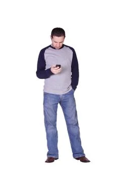 Mediterranean man checking his emails on his palm pilot Foto stock