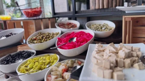 Mediterranean restaurant buffet with olives and pickles Vidéo 336643789