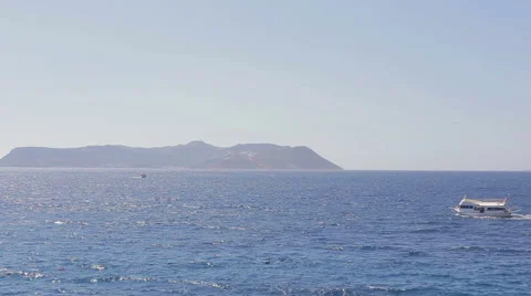 Mediterranean sea coast the boat sails on the sea Stock Footage