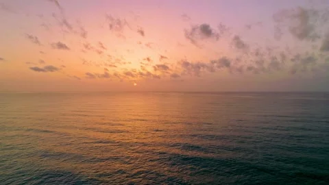 Mediterranean Sea loop with the clouds and sun shining in the background Video stock 179946977