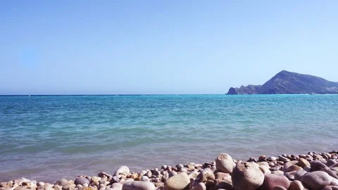 Mediterranean sea waves breaking on a rocky beach in Costa Blanca, Spain Stock Footage 92863097