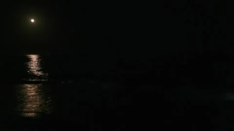 Mediterranean Sea with waves gently lapping the beach full moon Vídeo Stock 281584115