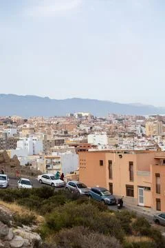 Mediterranean Town with Mountain Backdrop Foto stock