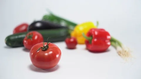 Mediterranean vegetables on white, shallow focus on tomato 스톡 동영상 75869681