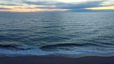 Mediterranean waves beach at sunset Stock Footage 146799846
