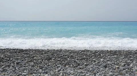 Mediterranean waves breaking on the beach in Nice, France. Stock Footage 54003196