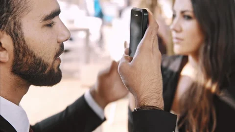 Medium 4k video of frustrated middle eastern man receiving bad news using app on Stock Footage 201095649