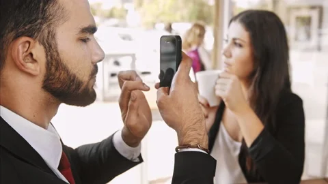 Medium 4k video of middle eastern using app, with hand gestures on smart phone i Stock Footage 201095698