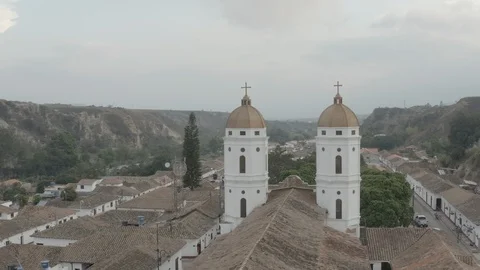 Medium aerial circles around back of the Playa de Belen church in Colombia Video stock 128025504