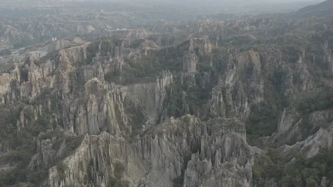 Medium aerial circles high above the Los Estoraques park in Colombia Stock-Footage 127946410