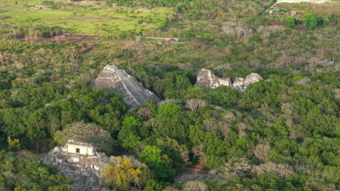 Medium Aerial Flyover Shot of the Mayan Ruins at Becan, Mexico Stock Footage 311113928
