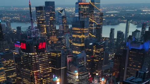 Medium aerial shot around high-rise in Times square and Hudson Yards, dusk in NY Stock Footage 293060300