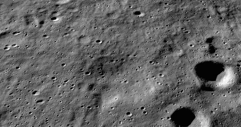Medium-altitude circular tracking shot: southeast of Casutus crater Stock Footage 112033249