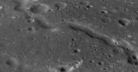 Medium-altitude circular tracking shot: SE edge, Montes Carpatus range Stock Footage 112035284