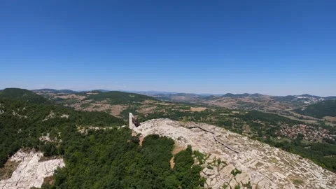 Medium-Altitude Descending Reverse Flight Over Perperikon Stock Footage 321554596