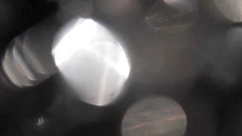 Medium and large bright bokeh light leaks in the black Video stock 318058158