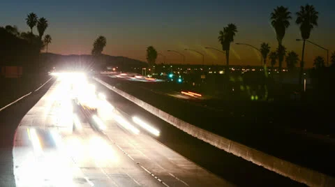 Medium angle Time lapse of morning rush hour traffic on the Ventura Freeway on Stock Footage 27187579