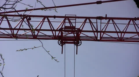 Medium close up of crane pulley mechanism Stock Footage 22794464