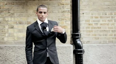 Medium close-up of an elegant groom Stock-Footage 20472971