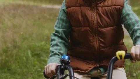Medium close front view boy cycling outdoor sport Stock Footage 316580953
