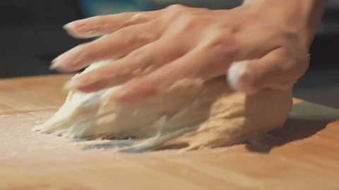 Medium close up gluten developing hand knead bread loaf for sourdough Stock Footage 127960847