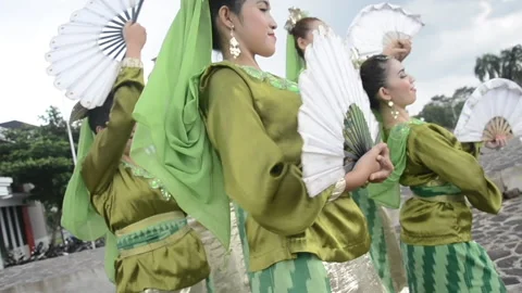 Medium close up Malay group of women dancing ethnic dances Stock Footage 147118564