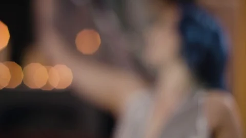 Medium close up of model on sofa pull focus Stock Footage 109488695