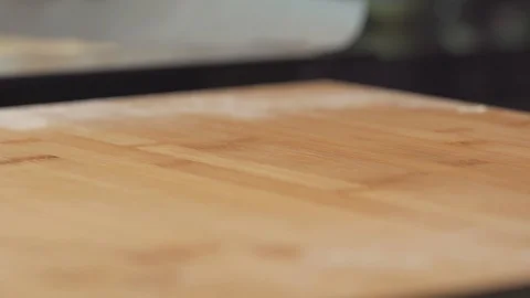 Medium close up opening a can of tomato pase sauce for pizza base a can opener Stock Footage 127966756