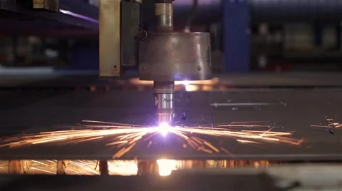 Medium close plasma cuter cutting holes in steel Stock Footage 60640662