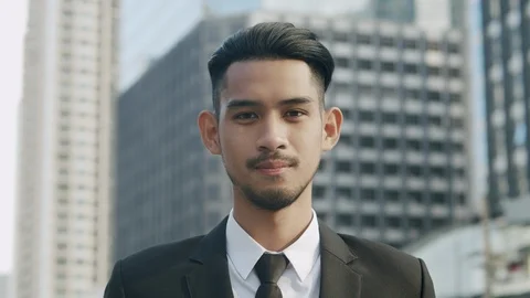 Medium close up. Portrait of Handsome young businessman Stock Footage 120812618