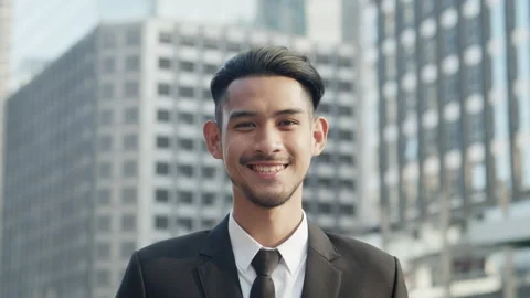 Medium close up. Portrait of Handsome young businessman Video stock 138099717