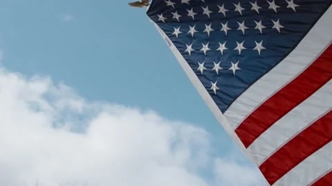 Medium Close Up Shot of the American Flag Waving in the Wind Video stock 133018970