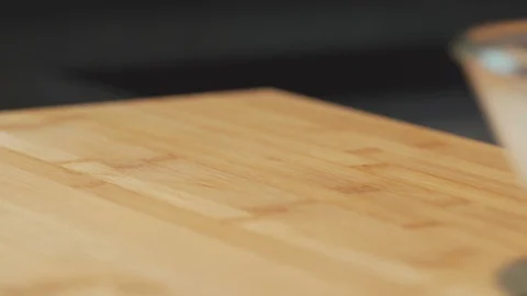 Medium close up shot stirring yeast water in a small bowl for pizza dough Stock Footage 127953556