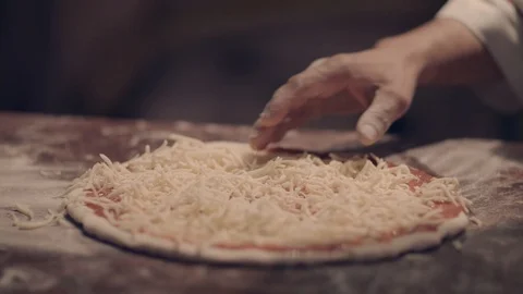 Medium Close Spreading Cheese On Pizza Stock Footage 96289531