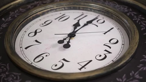 Medium Close Up Static Shot of Antique Clock with Spinning Hands Stock Footage 336090839