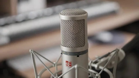 Medium closeup of expensive microphone - tilt up and down Stock Footage 50245012