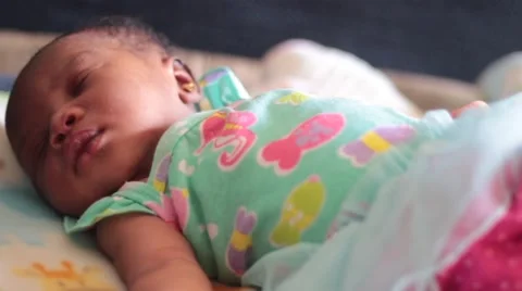 Medium of Cute Week Old Baby as she sleeps and flutters her lashes Vídeos de archivo 61773207