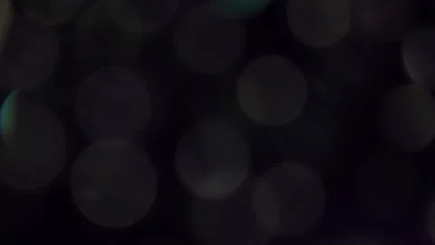 Medium dark and bright bokeh glowing on a dark background 库存影片 318662264