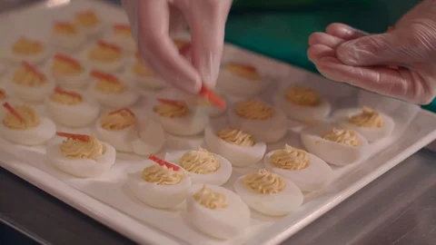 Medium Decorating Filled Eggs Stock Footage 96289486