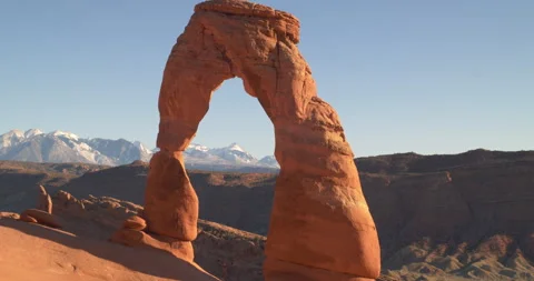 Medium of Delicate Arch with snowy La Sal Mountains framed in the distance Stock-Footage 303407912