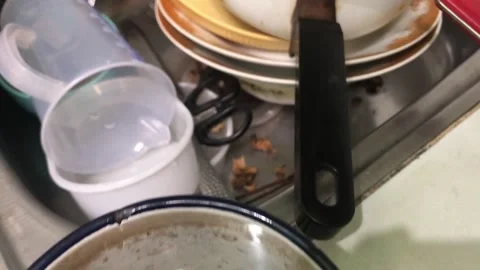Medium dirty dishes in the sink Stock Footage 308227165