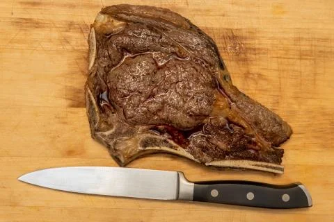 Medium Fried Tomahawk Steak with Knife Stock Photos