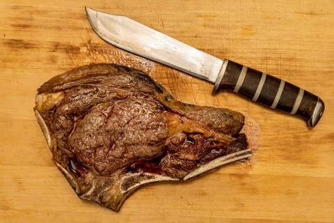 Medium Fried Tomahawk Steak with Knife Stock Photos