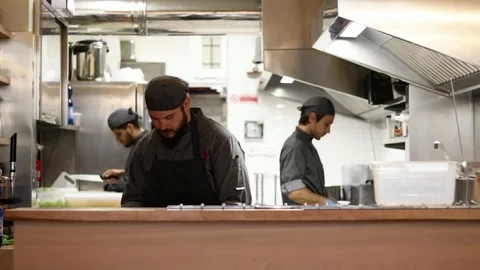Medium front shot chefs working, ramen bar, Florence, Italy, HD Stock Footage 93102081