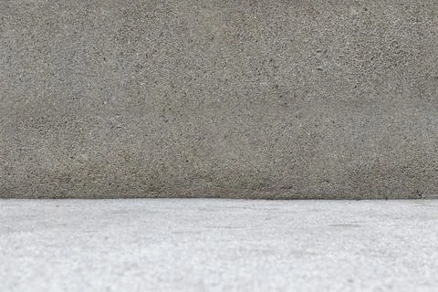 Medium gray pebble wall light colored stone floor For inserting text or image Stock Photos